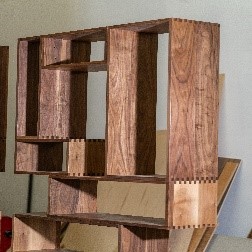 crafted negative space bookcases